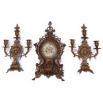 Bronzen pendule met kandelaars