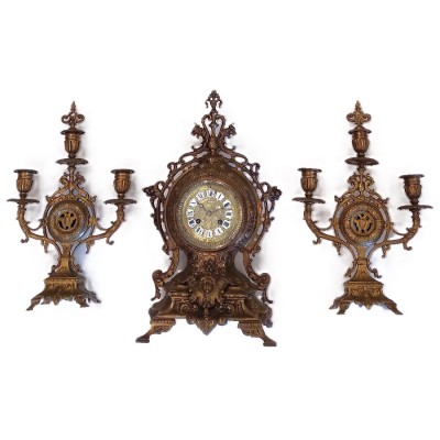 Bronzen pendule met kandelaars Bronzen pendule met kandelaars